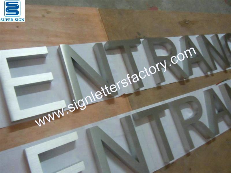 Fabricated brushed stainless steel lettering