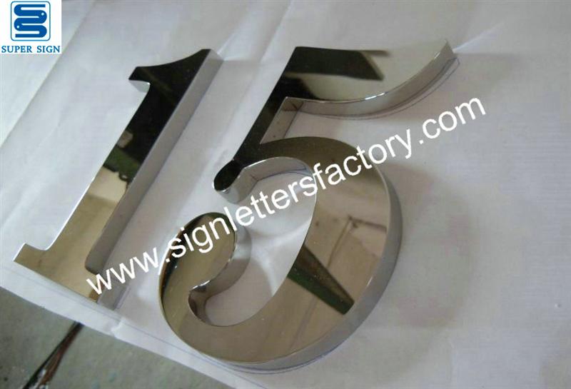 Fabricated polished stainless steel sign numbers