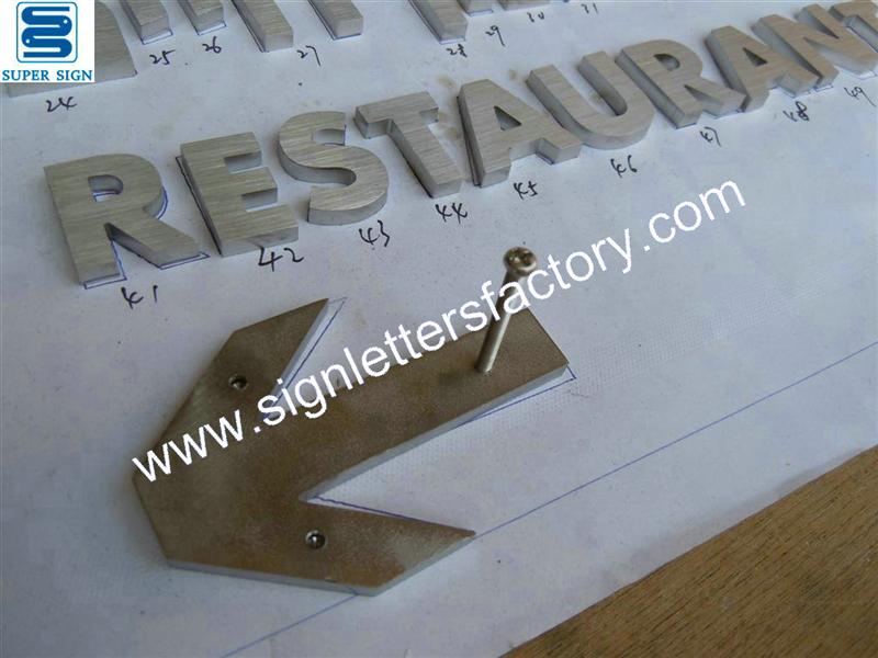 interior flat cut solid stainless steel sign