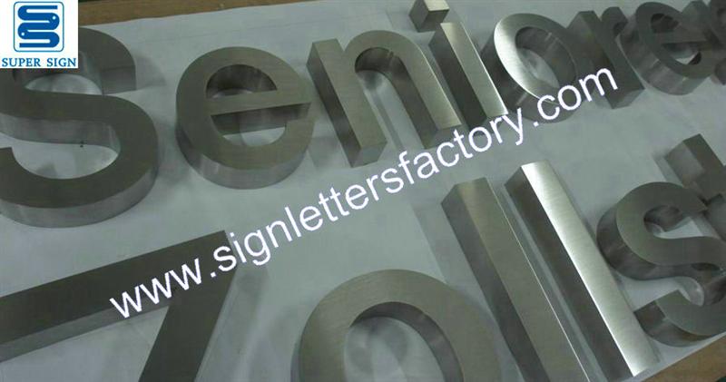 brushed stainless steel lettering signage