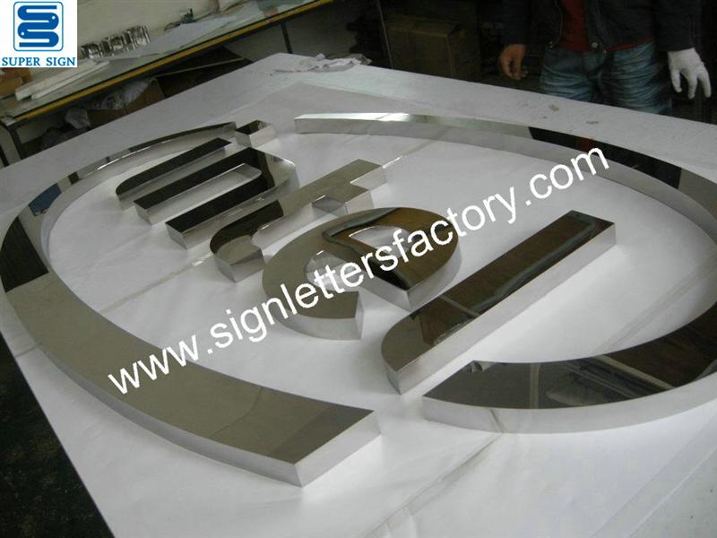 Fabricated polished mirror stainless steel sign