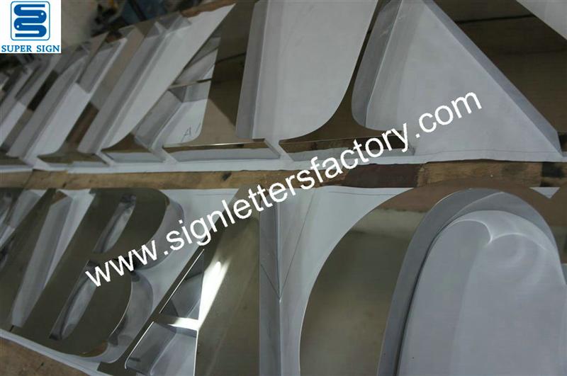Fabricated polished stainless steel letter